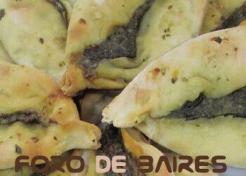 Puestos gastronómicos y espectáculos musicales en la Fiesta de La Empanada