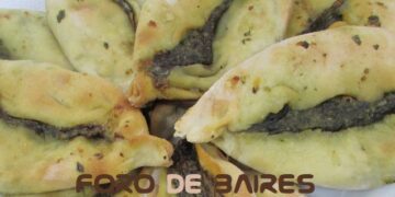 Puestos gastronómicos y espectáculos musicales en la Fiesta de La Empanada
